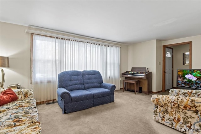 152 Nicholson St, Buffalo, NY 14216 - carpeted living area with healthy amount of natural light