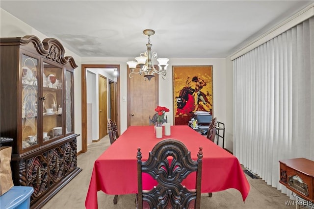 152 Nicholson St, Buffalo, NY 14216 - carpeted dining area featuring a chandelier