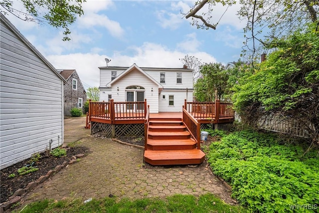 rear view of property with a deck
