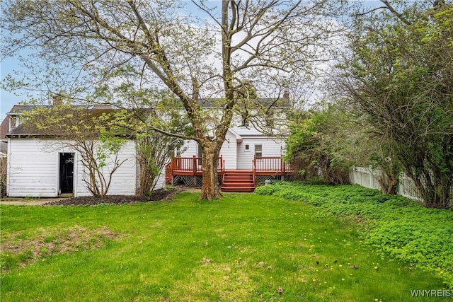 view of yard with a wooden deck