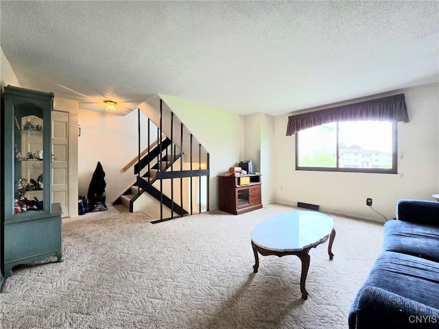 332 Cameco Cir, Salina, NY 13090 - carpeted living area with a textured ceiling and stairs