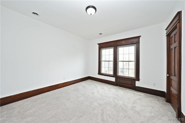 249 E St, Buffalo, NY 14207 - carpeted empty room with baseboards