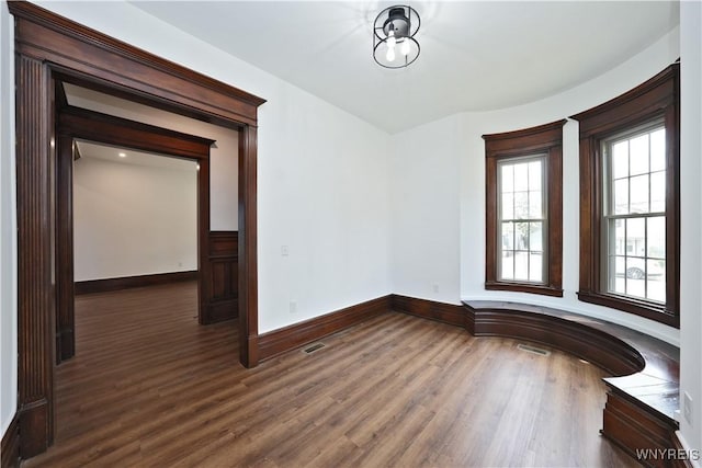 249 E St, Buffalo, NY 14207 - spare room with wood finished floors and baseboards