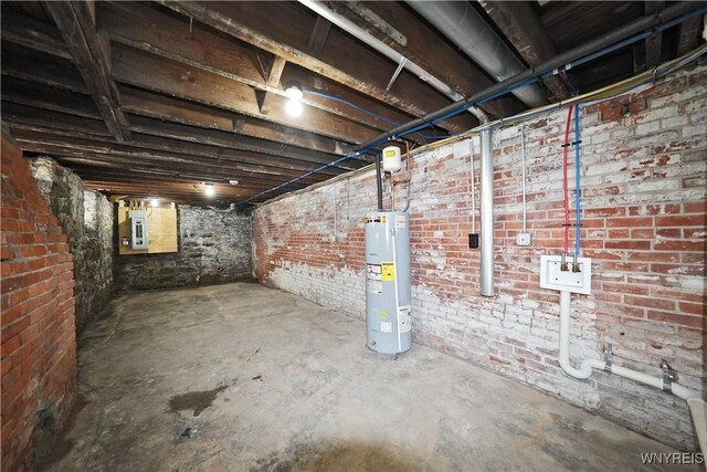 249 E St, Buffalo, NY 14207 - unfinished basement with water heater, electric panel, and brick wall