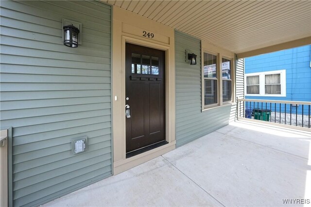 249 E St, Buffalo, NY 14207 - doorway to property with a porch
