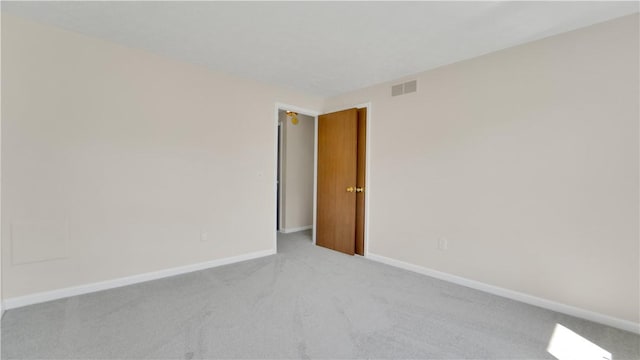 85 Kalyna Dr, Irondequoit, NY 14617 - carpeted empty room featuring baseboards