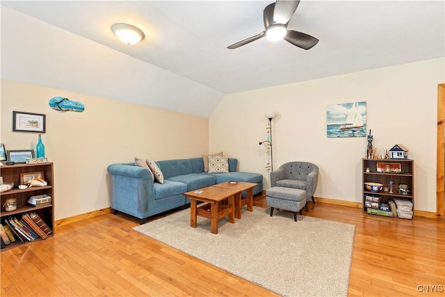 301 Silverstone Rd, Russia, NY 13438 - living area featuring a ceiling fan, light wood-type flooring, baseboards, and vaulted ceiling