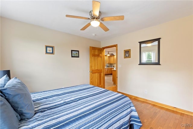 301 Silverstone Rd, Russia, NY 13438 - bedroom with light wood finished floors, baseboards, and ceiling fan