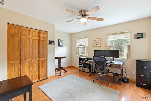 301 Silverstone Rd, Russia, NY 13438 - office featuring a ceiling fan, light wood-style floors, and baseboards