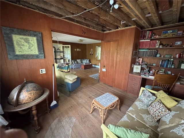3645 County Highway 12, Kortright, NY 13739 - living room featuring wood finished floors, wooden walls, and baseboard heating