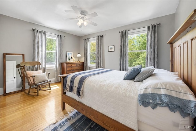 457 Broad St, Oneida-Inside, NY 13421 - bedroom with light wood-style floors and ceiling fan
