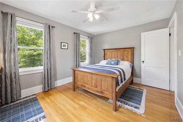 457 Broad St, Oneida-Inside, NY 13421 - bedroom featuring baseboards, light wood-type flooring, and a ceiling fan