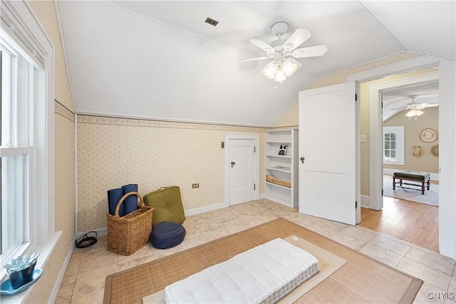 457 Broad St, Oneida-Inside, NY 13421 - living area with ceiling fan, vaulted ceiling, and light tile patterned floors