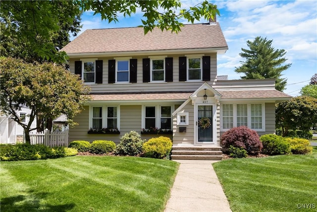 457 Broad St, Oneida-Inside, NY 13421 - view of front of house featuring a shingled roof and a chimney