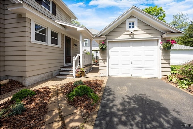 457 Broad St, Oneida-Inside, NY 13421 - view of front of property with driveway and an outdoor structure