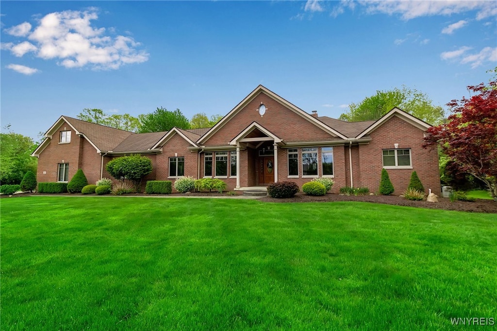 250 Crag Burn, Elma, NY 14052 - ranch-style home featuring brick siding and a front lawn