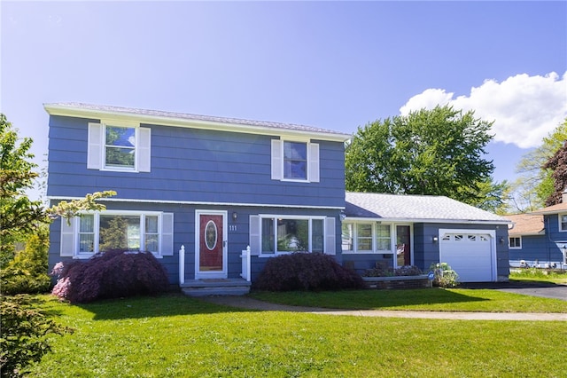 111 Barlow Dr, Greece, NY 14626 - view of front of house featuring a garage, a front lawn, and asphalt driveway