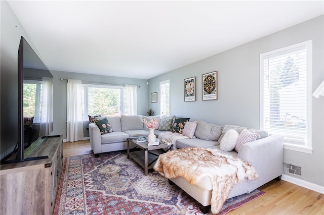 111 Barlow Dr, Greece, NY 14626 - living area with wood finished floors and baseboards
