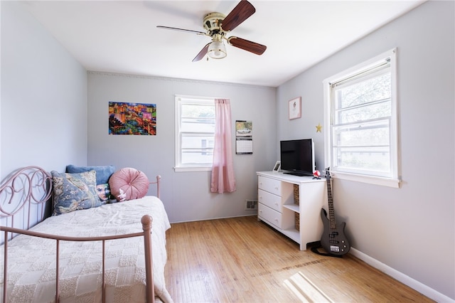 111 Barlow Dr, Greece, NY 14626 - bedroom featuring light wood-style flooring and ceiling fan