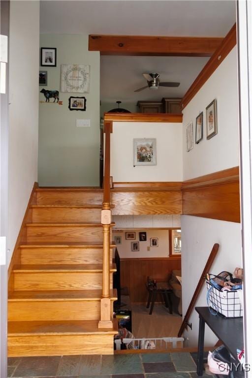95 Briarcliff Dr, Veteran, NY 14845 - staircase featuring a ceiling fan and wooden walls