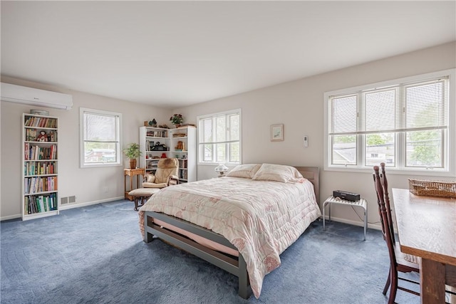 8508 Wickham Blvd, Sodus, NY 14555 - bedroom featuring multiple windows, a wall mounted air conditioner, and carpet floors