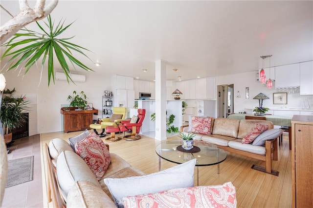 8508 Wickham Blvd, Sodus, NY 14555 - living room with an AC wall unit and light wood-type flooring
