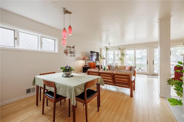 8508 Wickham Blvd, Sodus, NY 14555 - dining area with plenty of natural light, light wood-style floors, and baseboards
