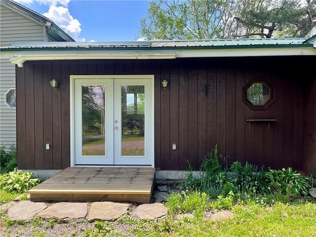 376 Upper Dutch Hill Rd, Milford, NY 13820 - entrance to property with french doors and metal roof