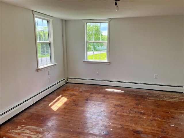 376 Upper Dutch Hill Rd, Milford, NY 13820 - unfurnished room with baseboard heating, hardwood / wood-style flooring, and healthy amount of natural light