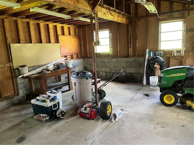 376 Upper Dutch Hill Rd, Milford, NY 13820 - miscellaneous room featuring a garage and concrete floors
