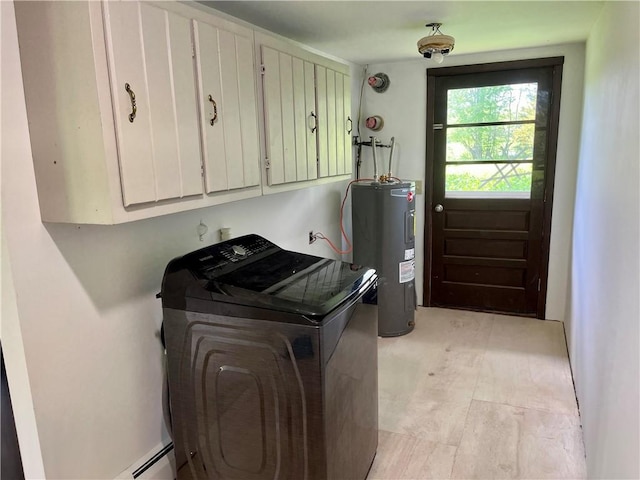 376 Upper Dutch Hill Rd, Milford, NY 13820 - laundry area featuring cabinet space, water heater, and washer / clothes dryer