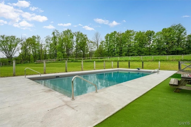 6924 Lebanon Rd, Lebanon, NY 13332 - view of swimming pool with view of wooded area and a patio