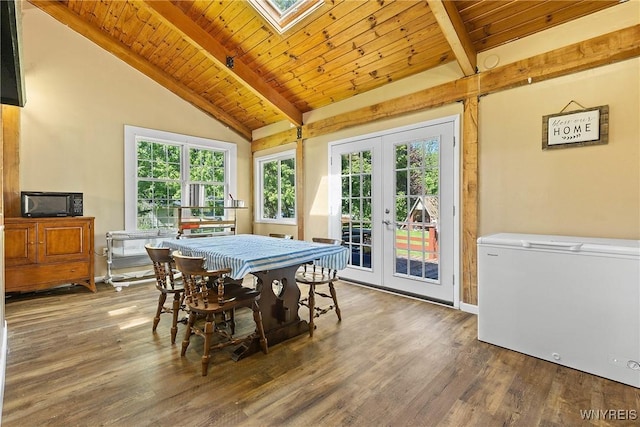 7508 Lakeside Rd, Ontario, NY 14519 - dining room featuring french doors, wood ceiling with exposed beams, healthy amount of natural light, wood finished floors, and high vaulted ceiling