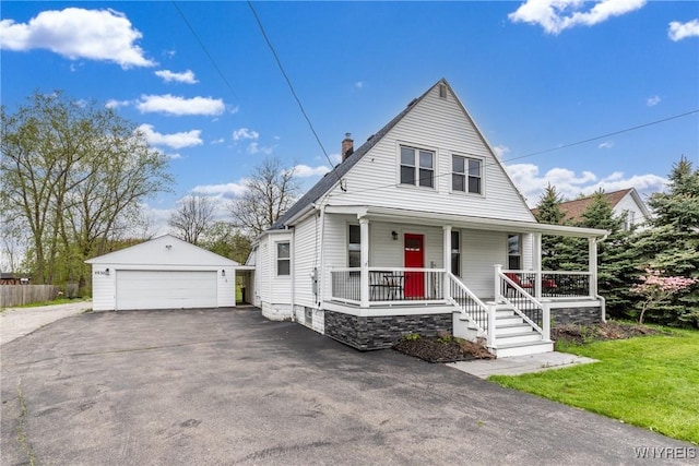 4830 Transit Rd, Cheektowaga, NY 14043 - view of front of property with a detached garage, an outdoor structure, a porch, a chimney, and a front yard