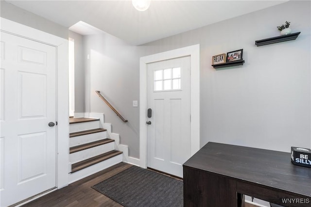 4830 Transit Rd, Cheektowaga, NY 14043 - entrance foyer featuring dark wood-style flooring, baseboards, and stairs