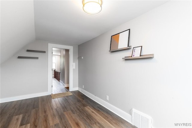 4830 Transit Rd, Cheektowaga, NY 14043 - hall with wood finished floors, baseboards, and lofted ceiling