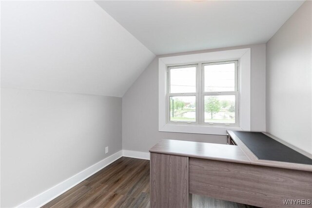 4830 Transit Rd, Cheektowaga, NY 14043 - unfurnished office featuring baseboards, dark wood-style flooring, and lofted ceiling