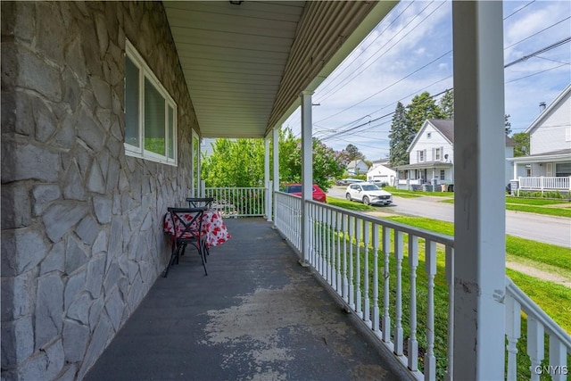 401 Palmer St, Frankfort, NY 13340 - porch featuring a residential view and a yard