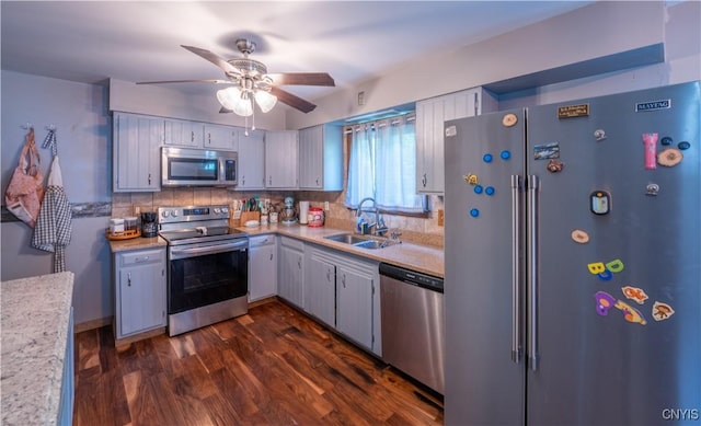 401 Palmer St, Frankfort, NY 13340 - kitchen featuring appliances with stainless steel finishes, a sink, backsplash, and light countertops