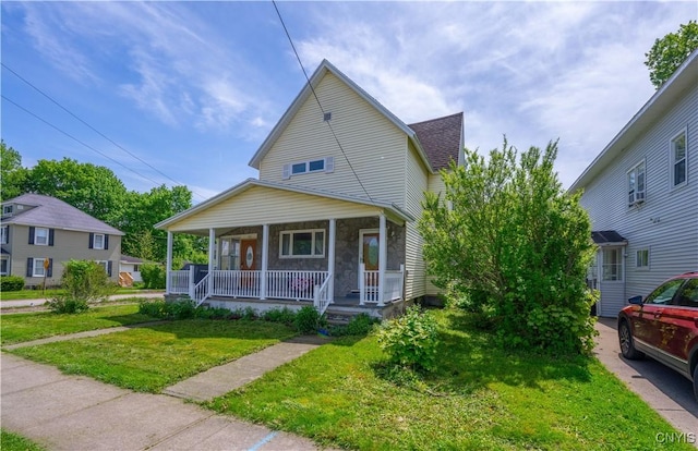 401 Palmer St, Frankfort, NY 13340 - view of front of house with a porch, stone siding, a front yard, and roof with shingles