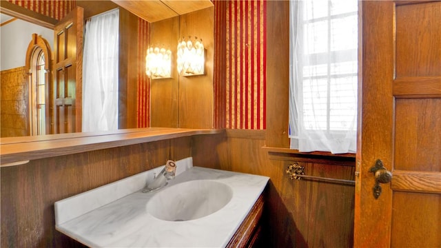 bathroom featuring healthy amount of natural light and vanity