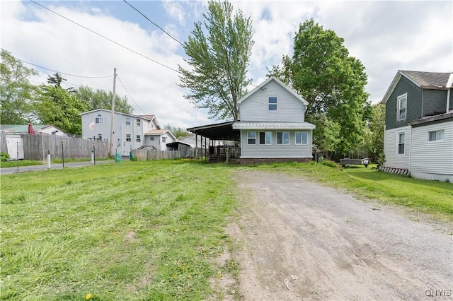124 Haven St, Watertown-City, NY 13601 - view of front of house with dirt driveway and metal roof