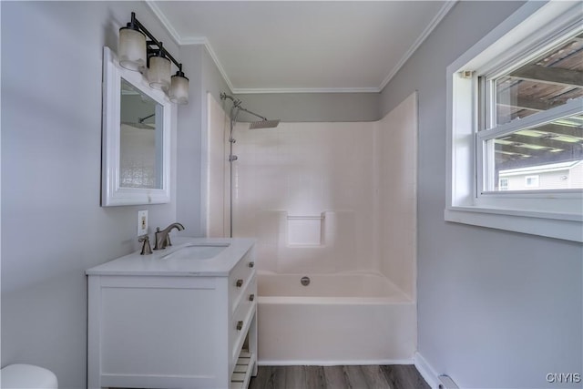 124 Haven St, Watertown-City, NY 13601 - bathroom featuring shower / tub combination, vanity, wood finished floors, ornamental molding, and toilet