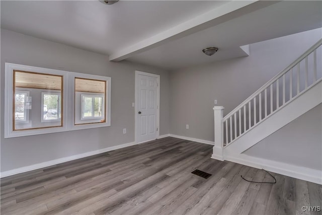 124 Haven St, Watertown-City, NY 13601 - entrance foyer with baseboards, wood finished floors, and stairs