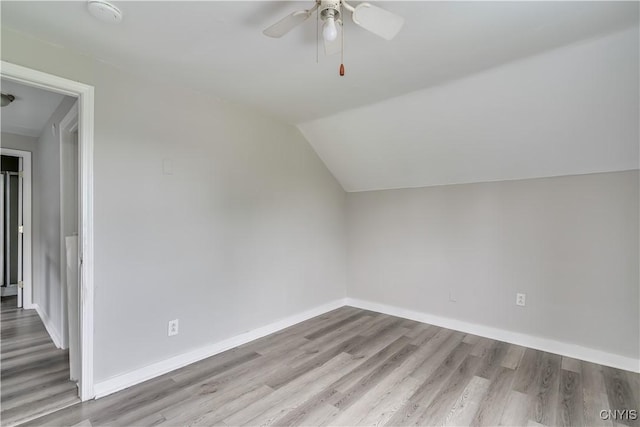 124 Haven St, Watertown-City, NY 13601 - additional living space featuring wood finished floors, a ceiling fan, baseboards, and vaulted ceiling