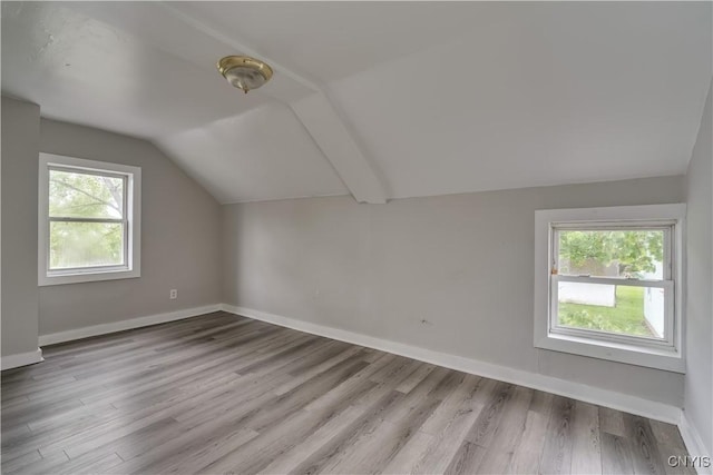 124 Haven St, Watertown-City, NY 13601 - bonus room with vaulted ceiling, wood finished floors, and baseboards
