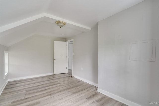 124 Haven St, Watertown-City, NY 13601 - additional living space with vaulted ceiling, light wood-style flooring, and baseboards