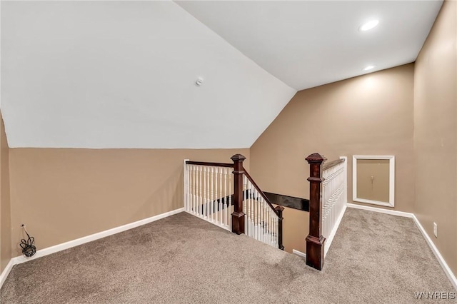397 14th St, Buffalo, NY 14213 - stairway with carpet flooring, vaulted ceiling, baseboards, and recessed lighting