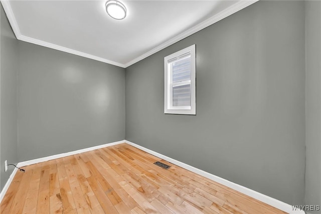 397 14th St, Buffalo, NY 14213 - unfurnished room with baseboards, ornamental molding, and hardwood / wood-style floors