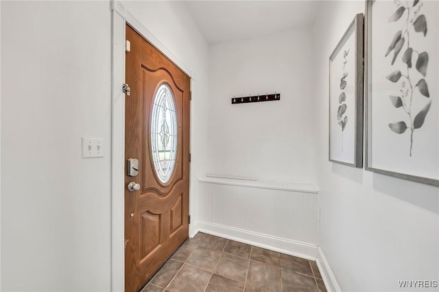 397 14th St, Buffalo, NY 14213 - foyer with baseboards and dark tile patterned flooring
